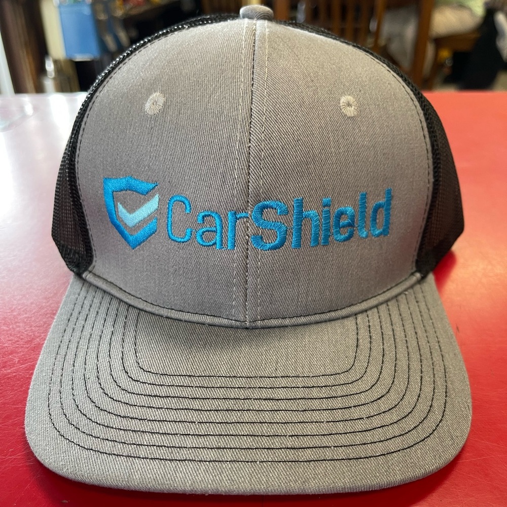 Brand new grey, black, and blue CarShield baseball/truckers cap/hat